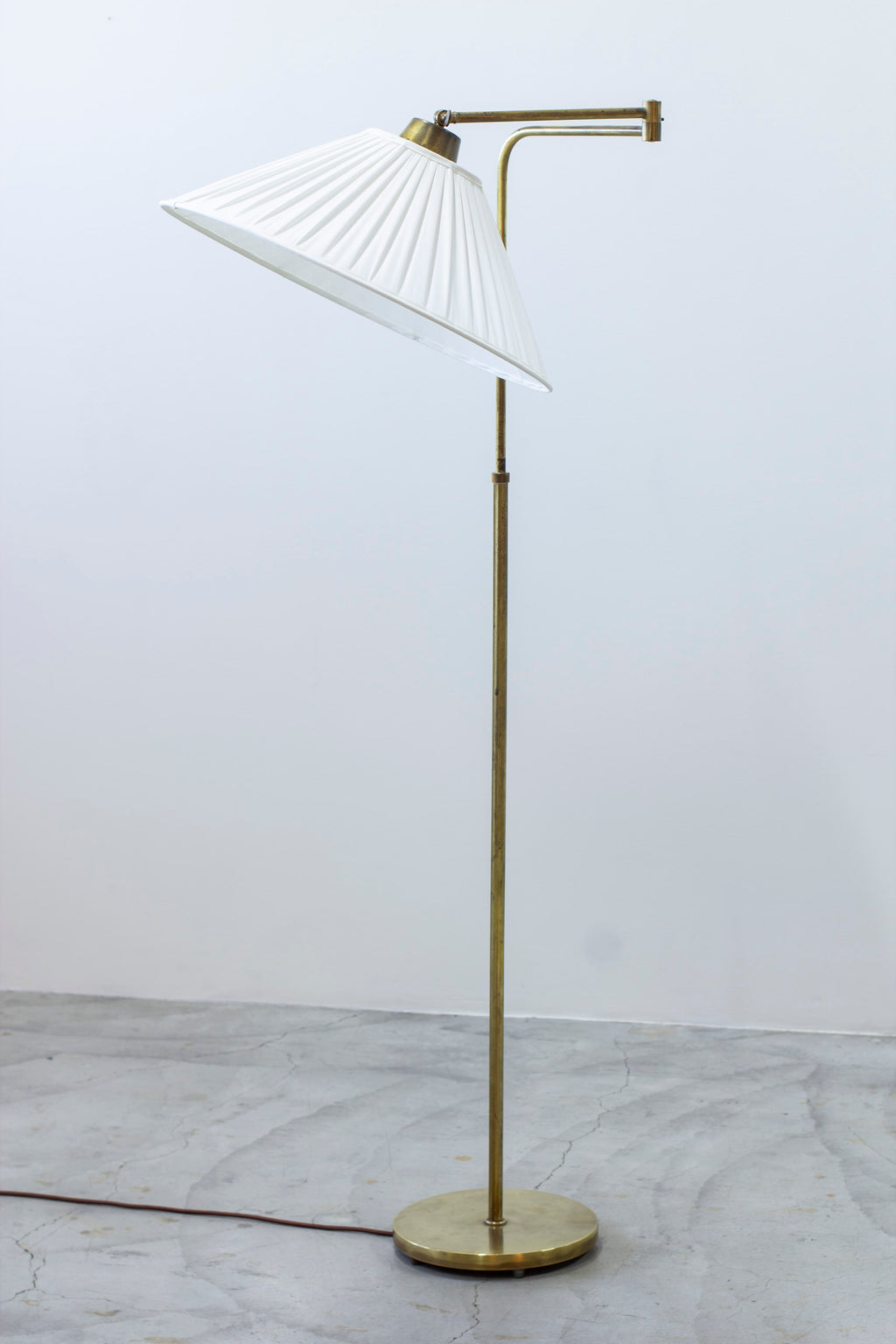 ON HOLD - Swedish modern floor lamp in the manner of Notini