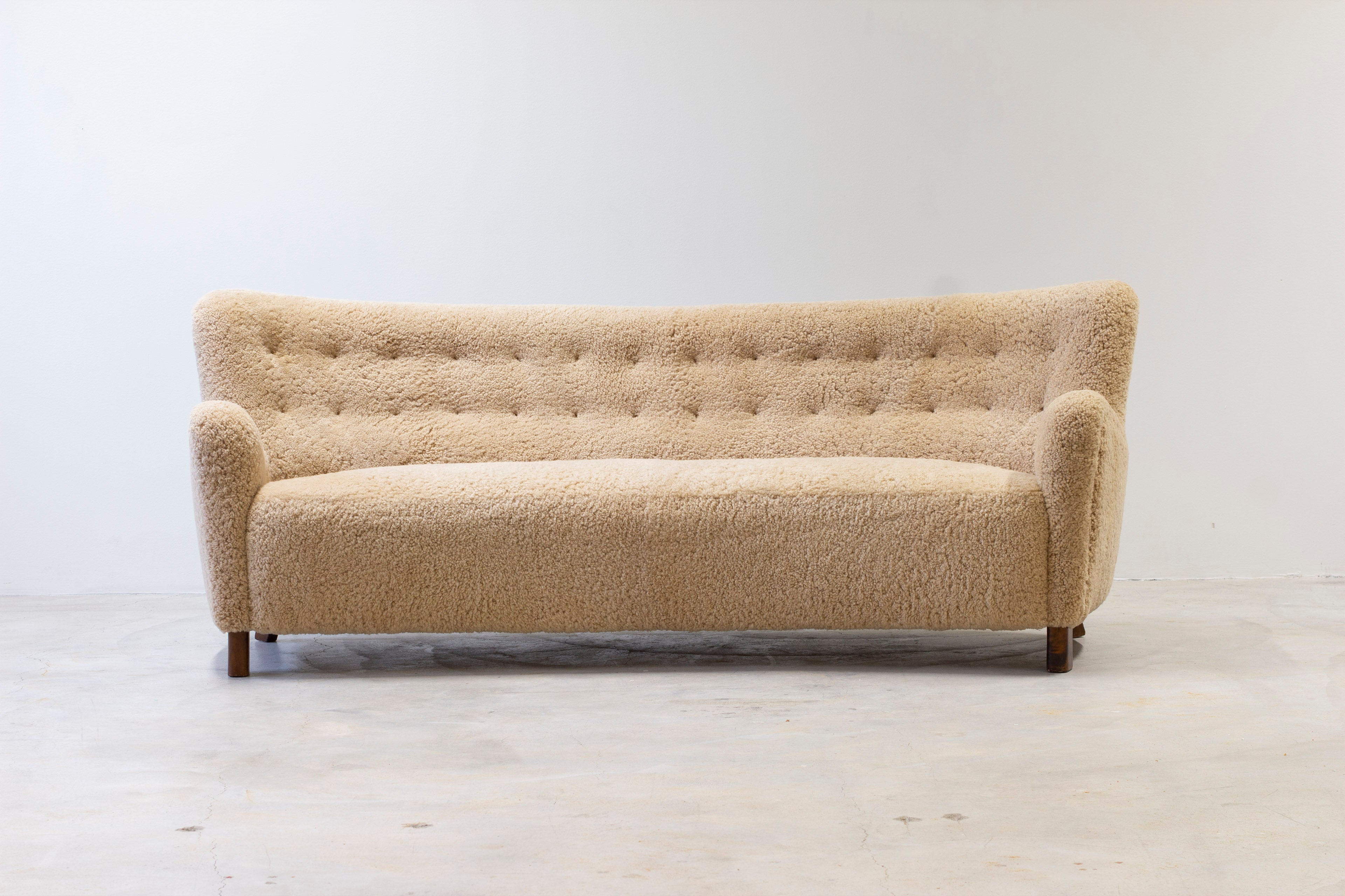 Curved sheeps skin sofa model 1669
