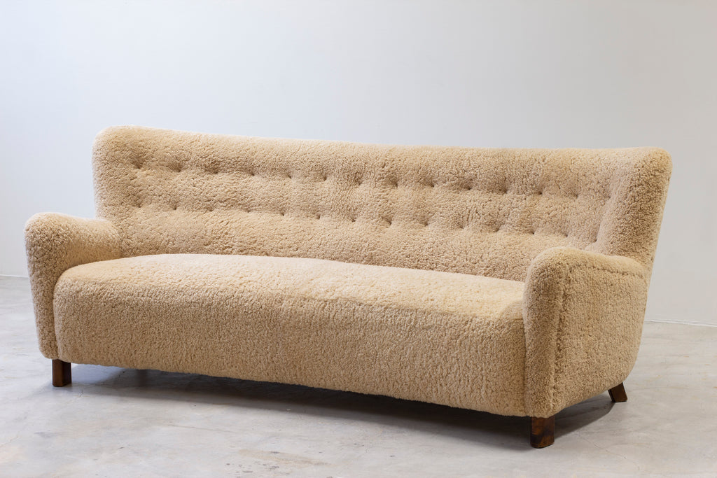 Curved sheeps skin sofa model 1669