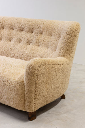 Curved sheeps skin sofa model 1669