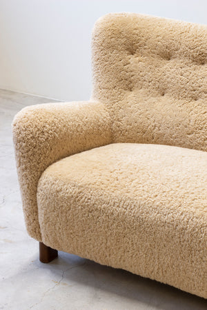 Curved sheeps skin sofa model 1669