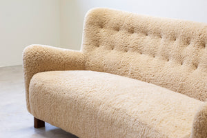 Curved sheeps skin sofa model 1669