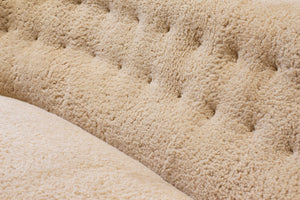 Curved sheeps skin sofa model 1669