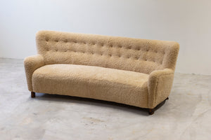 Curved sheeps skin sofa model 1669