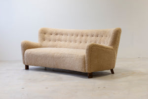 Curved sheeps skin sofa model 1669