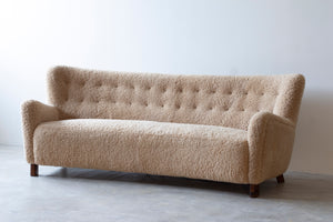 Curved sheeps skin sofa model 1669