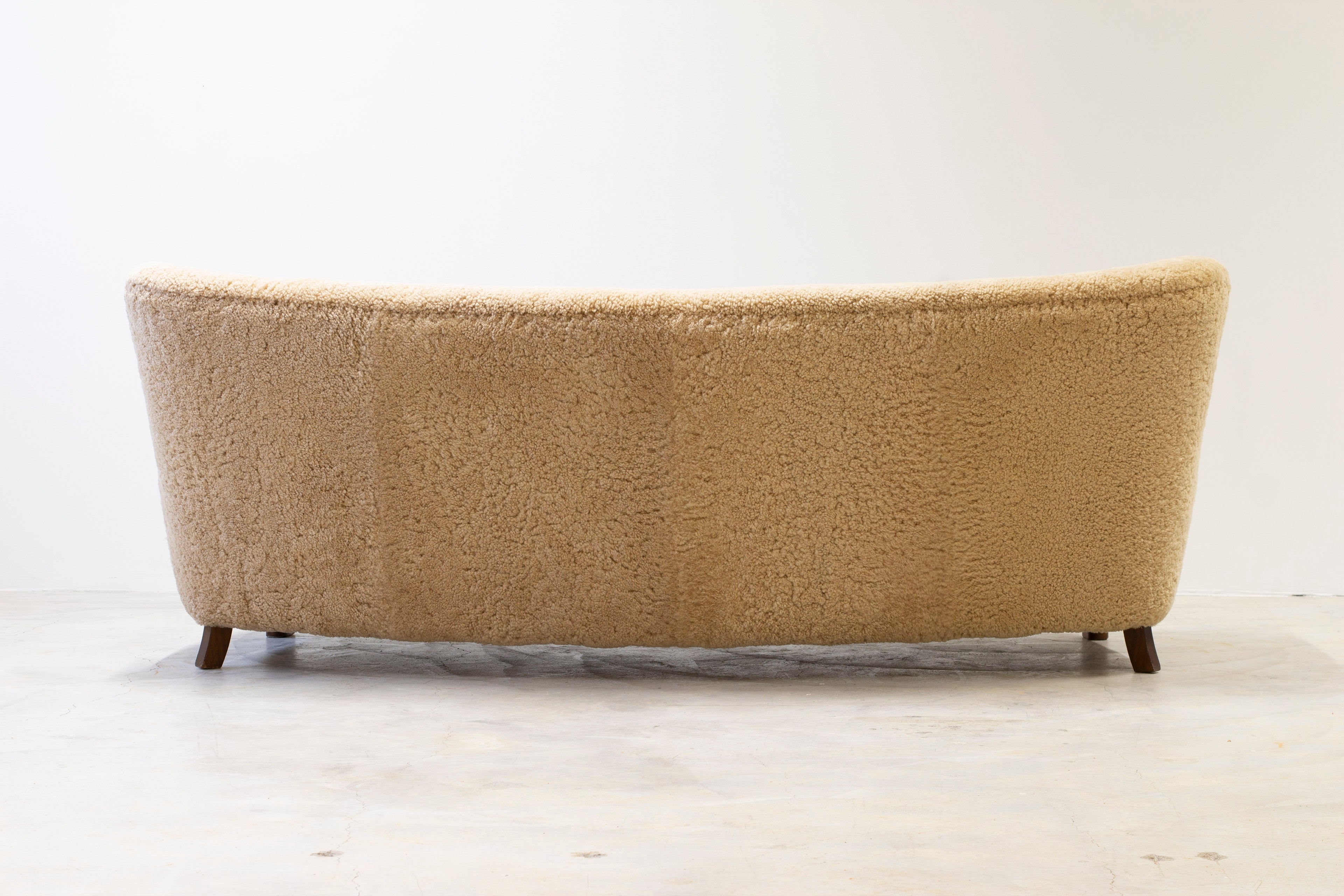 Curved sheeps skin sofa model 1669