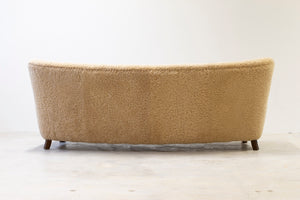 Curved sheeps skin sofa model 1669
