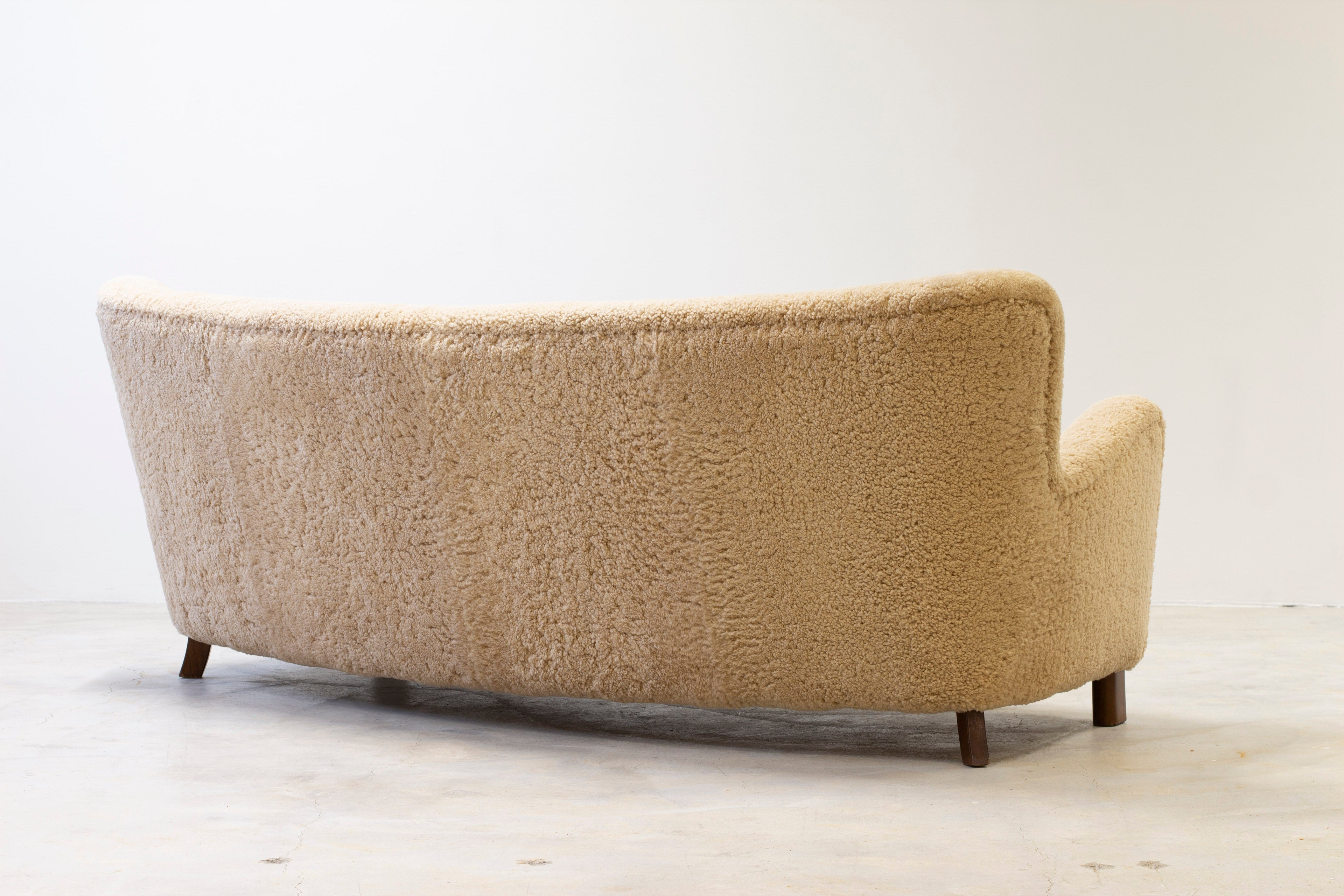 Curved sheeps skin sofa model 1669