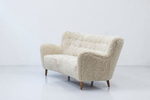 Danish modern sofa with sheep skin