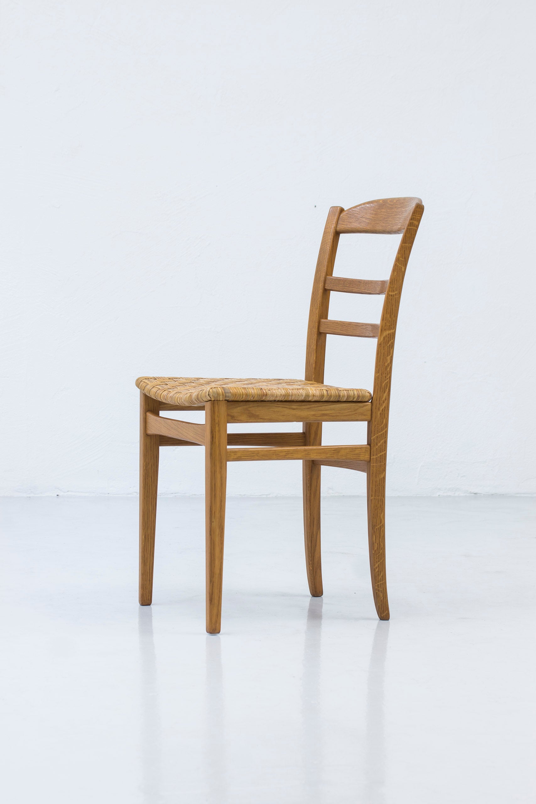 Dining chairs by Carl Malmsten