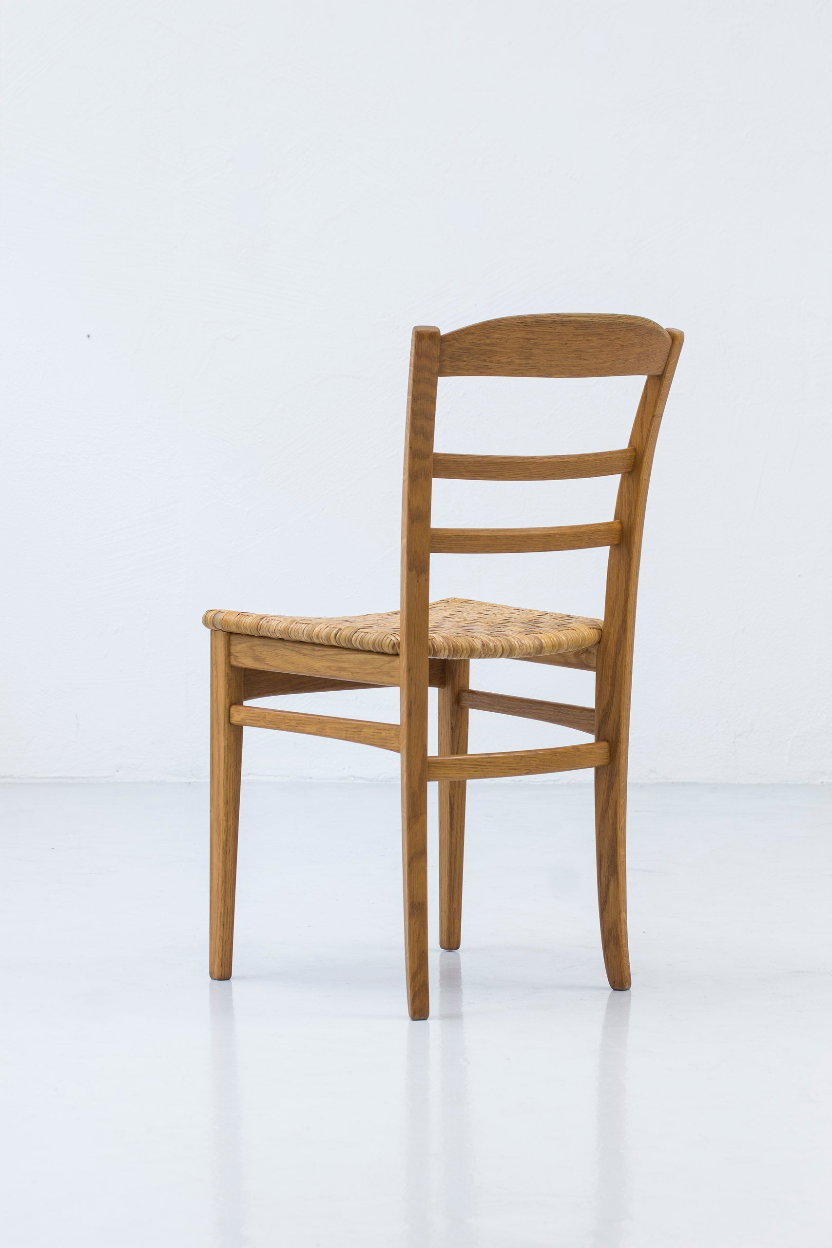 Dining chairs by Carl Malmsten