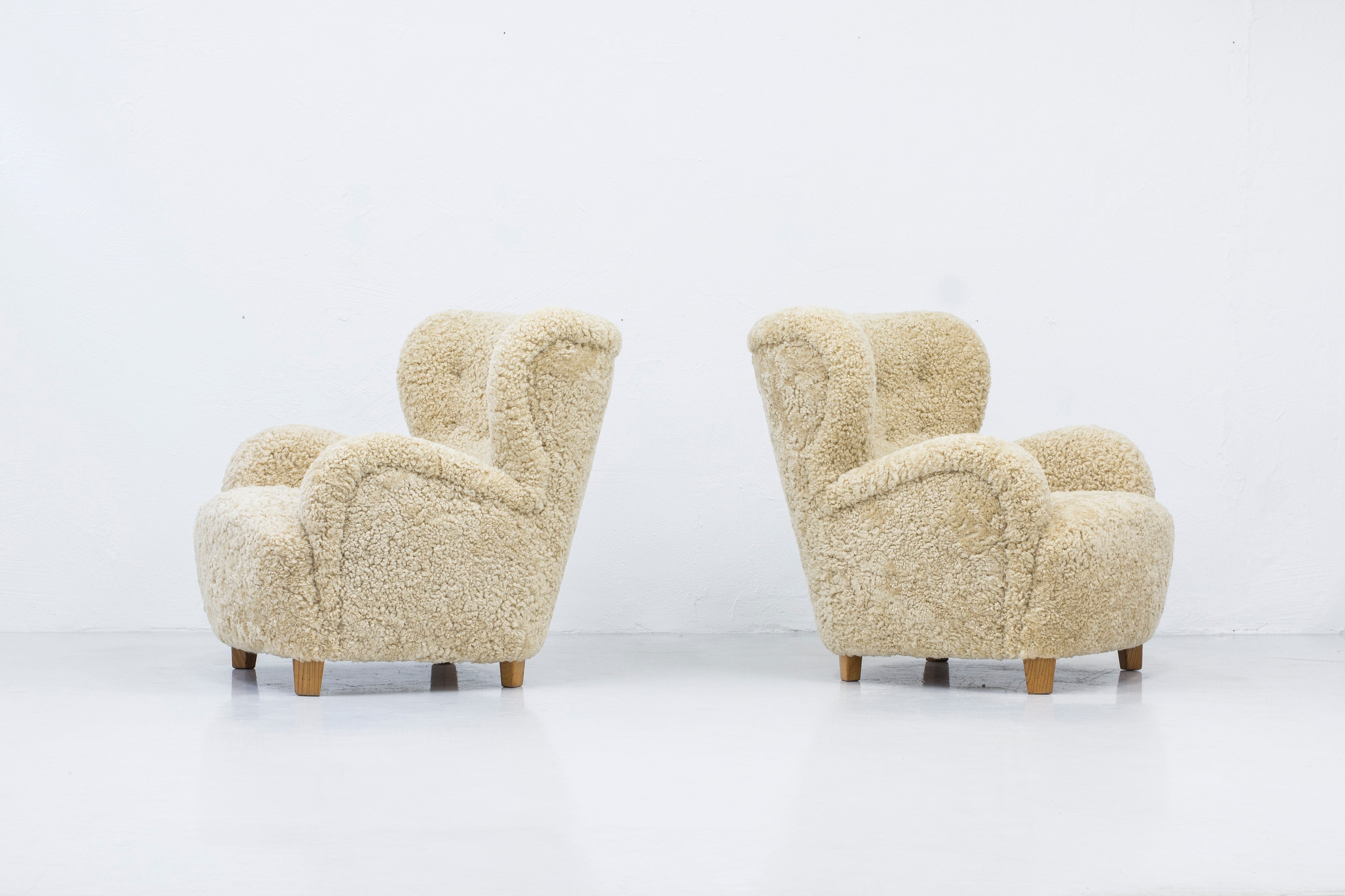 Sheep skin lounge chairs in the style of Lassen