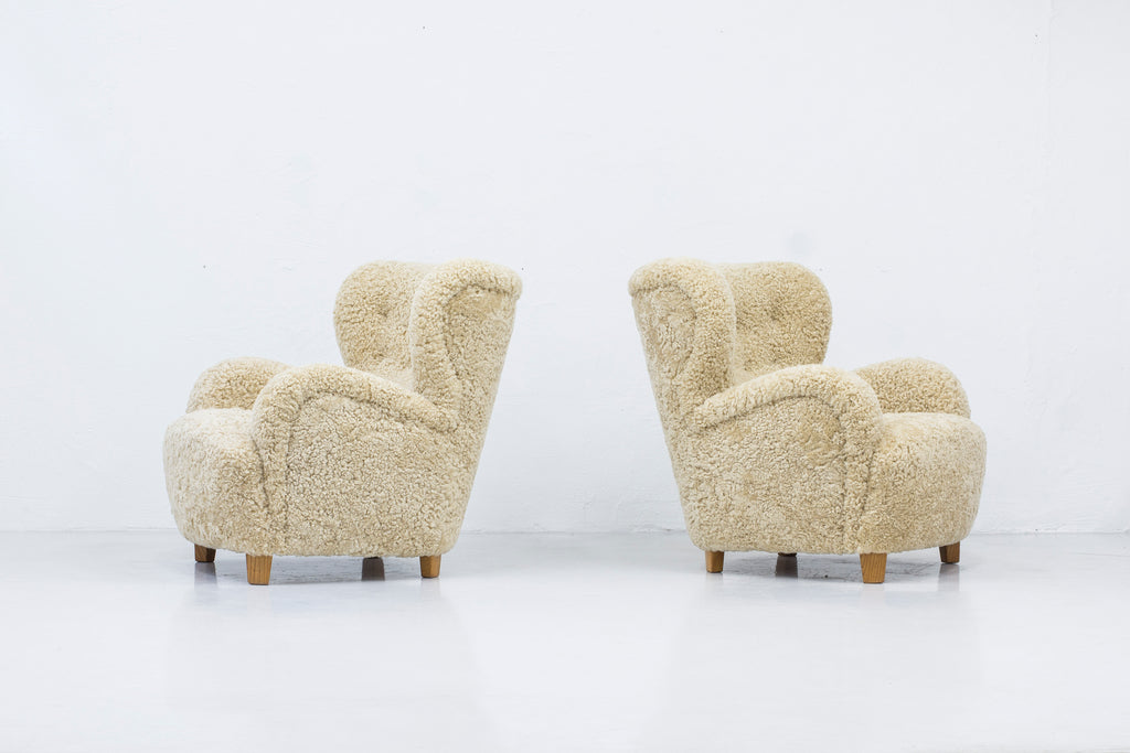 Sheep skin lounge chairs in the style of Lassen
