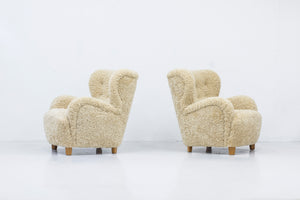 Sheep skin lounge chairs in the style of Lassen