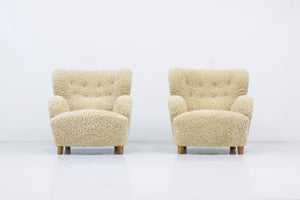 Sheep skin lounge chairs in the style of Lassen