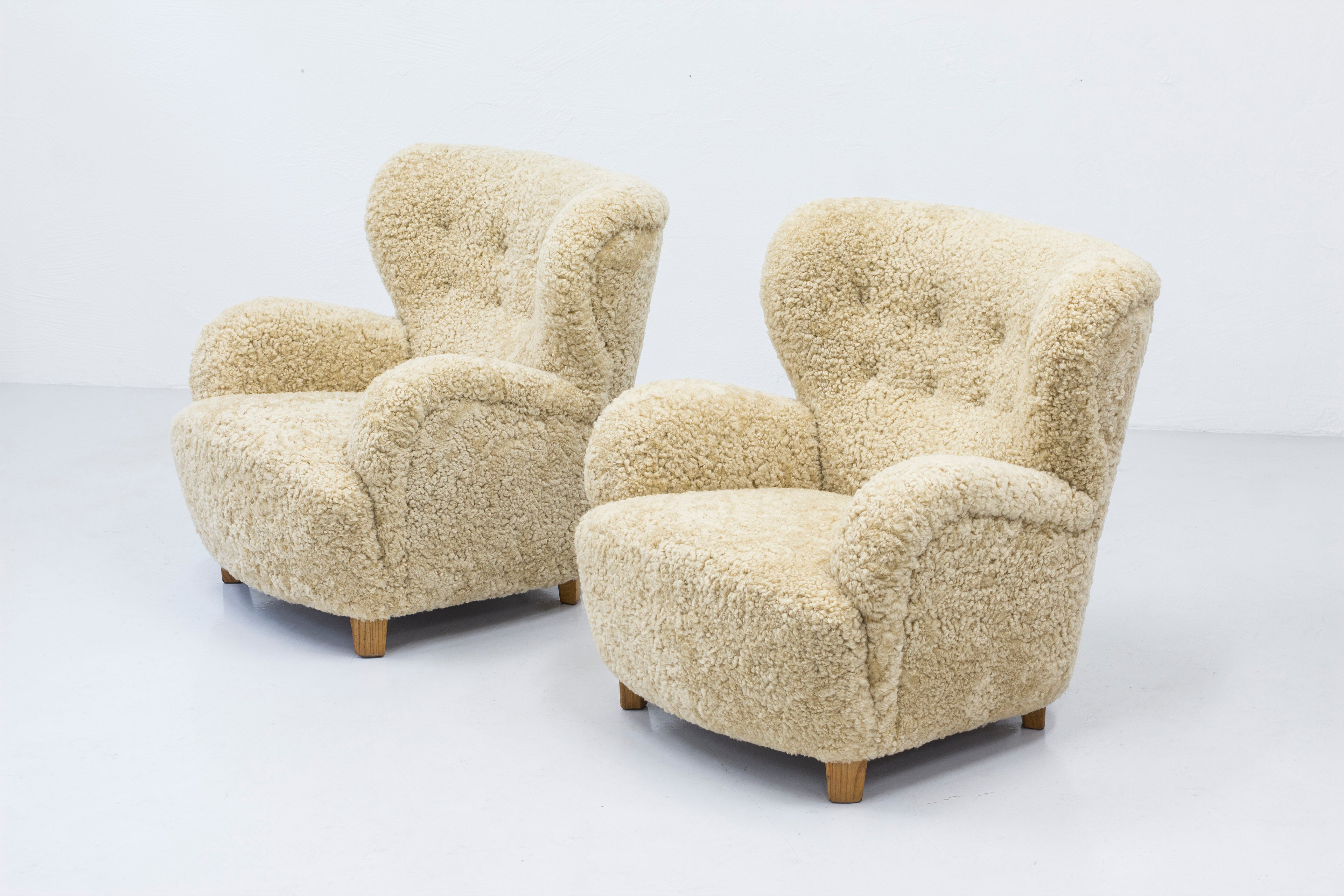 Sheep skin lounge chairs in the style of Lassen