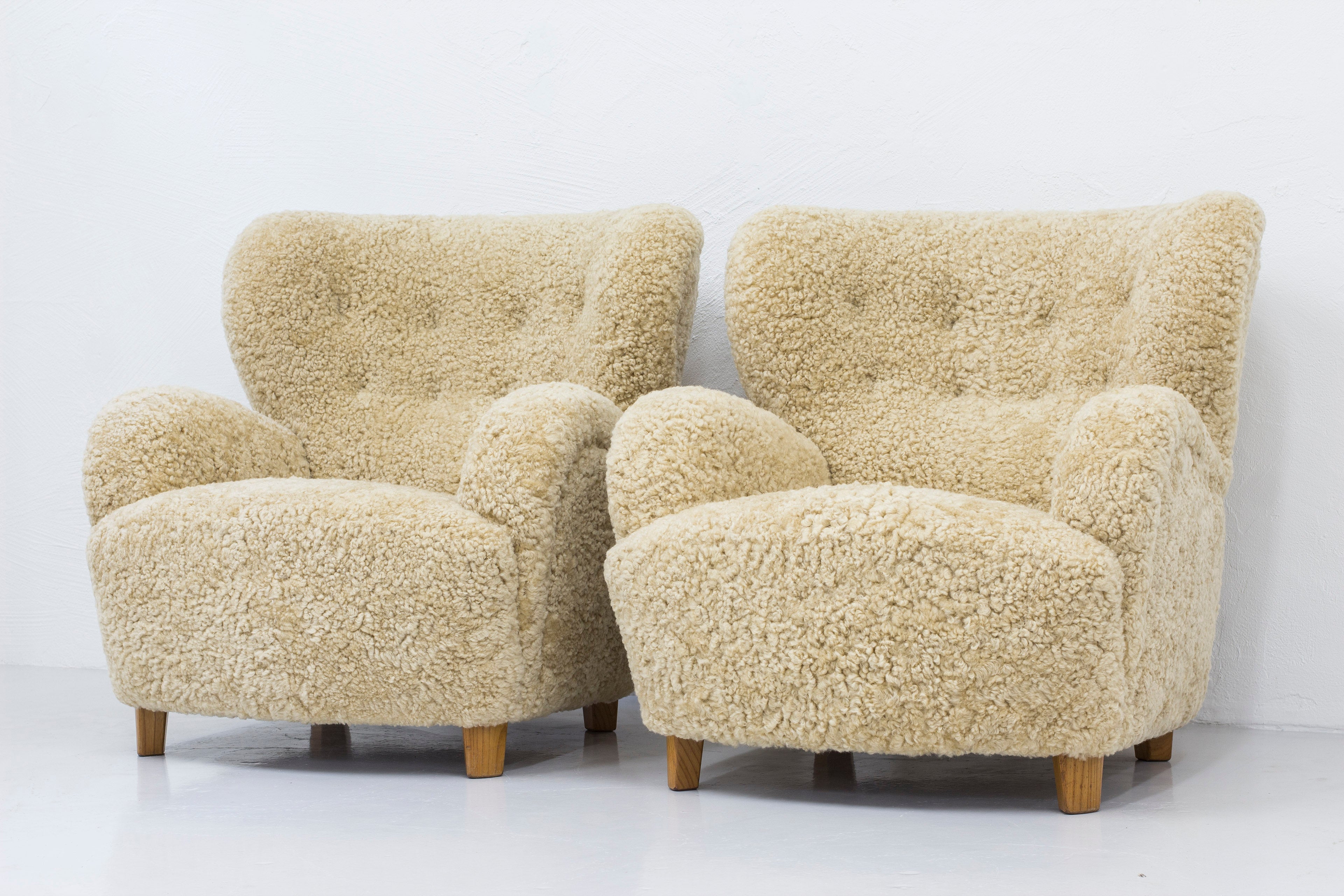 Sheep skin lounge chairs in the style of Lassen
