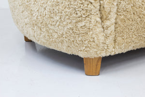 Sheep skin lounge chairs in the style of Lassen