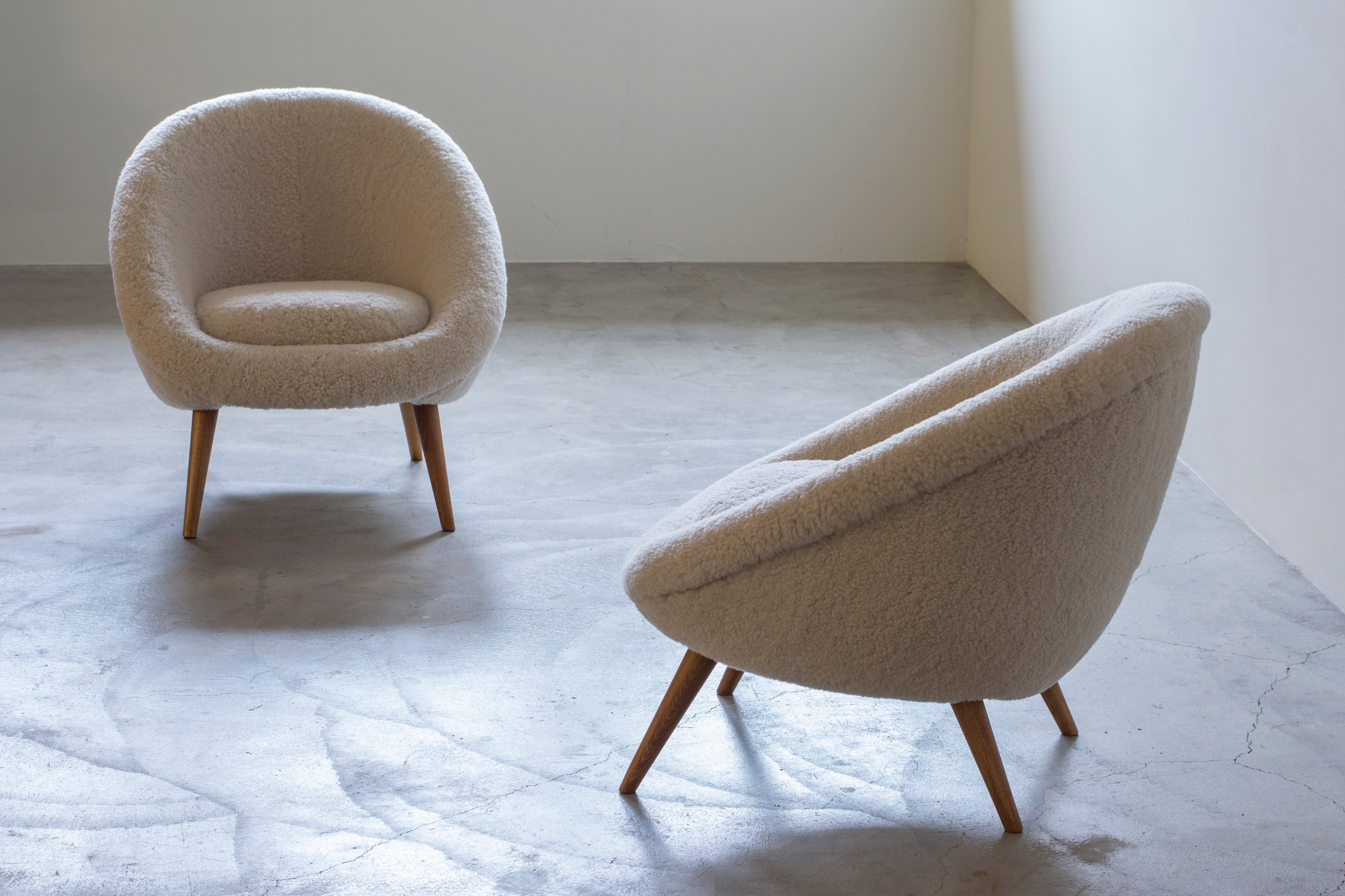 Lounge chairs "Oeuf" in the style of Jean Royere