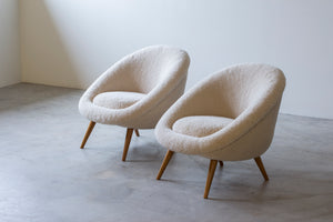 Lounge chairs "Oeuf" in the style of Jean Royere