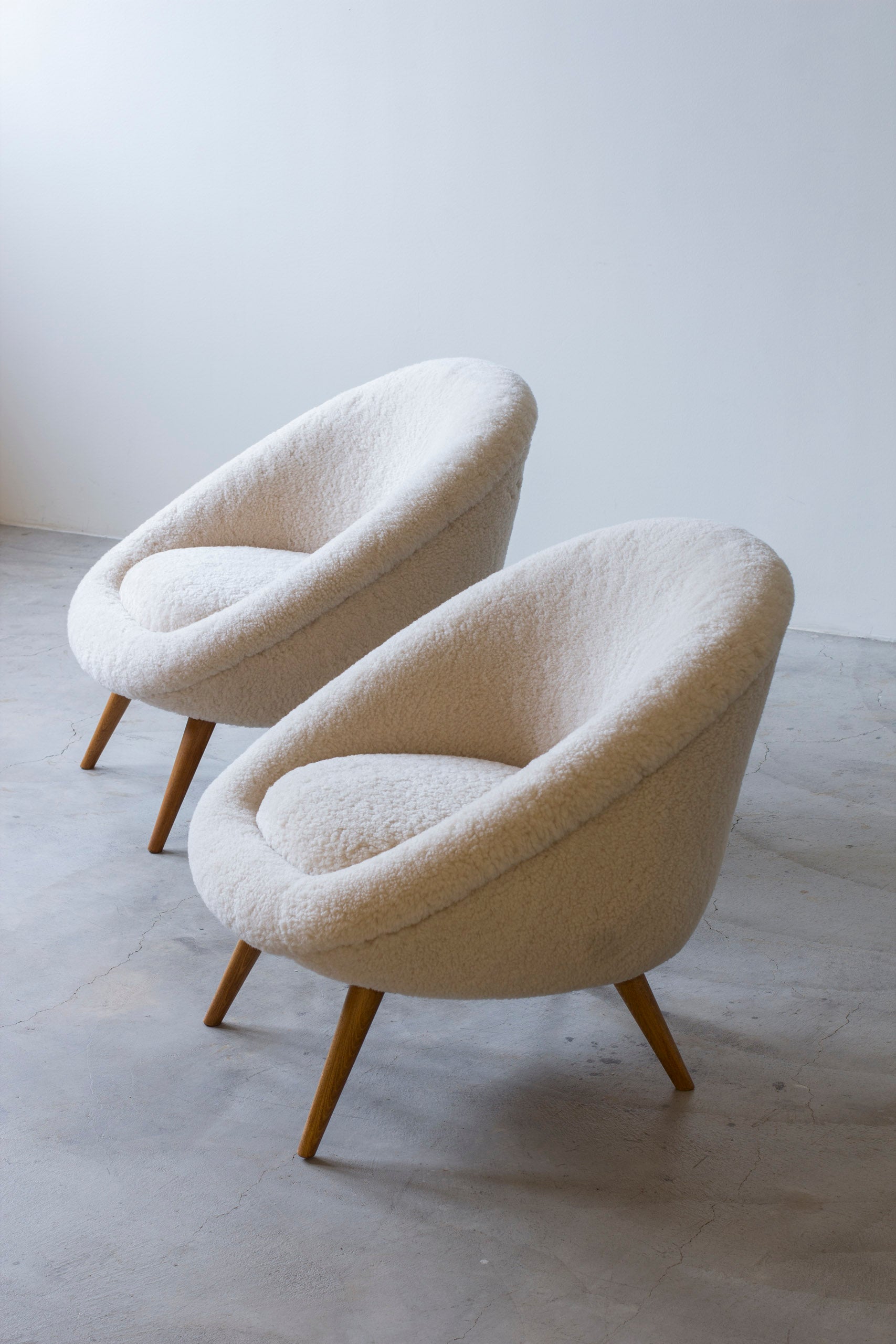 Lounge chairs "Oeuf" in the style of Jean Royere