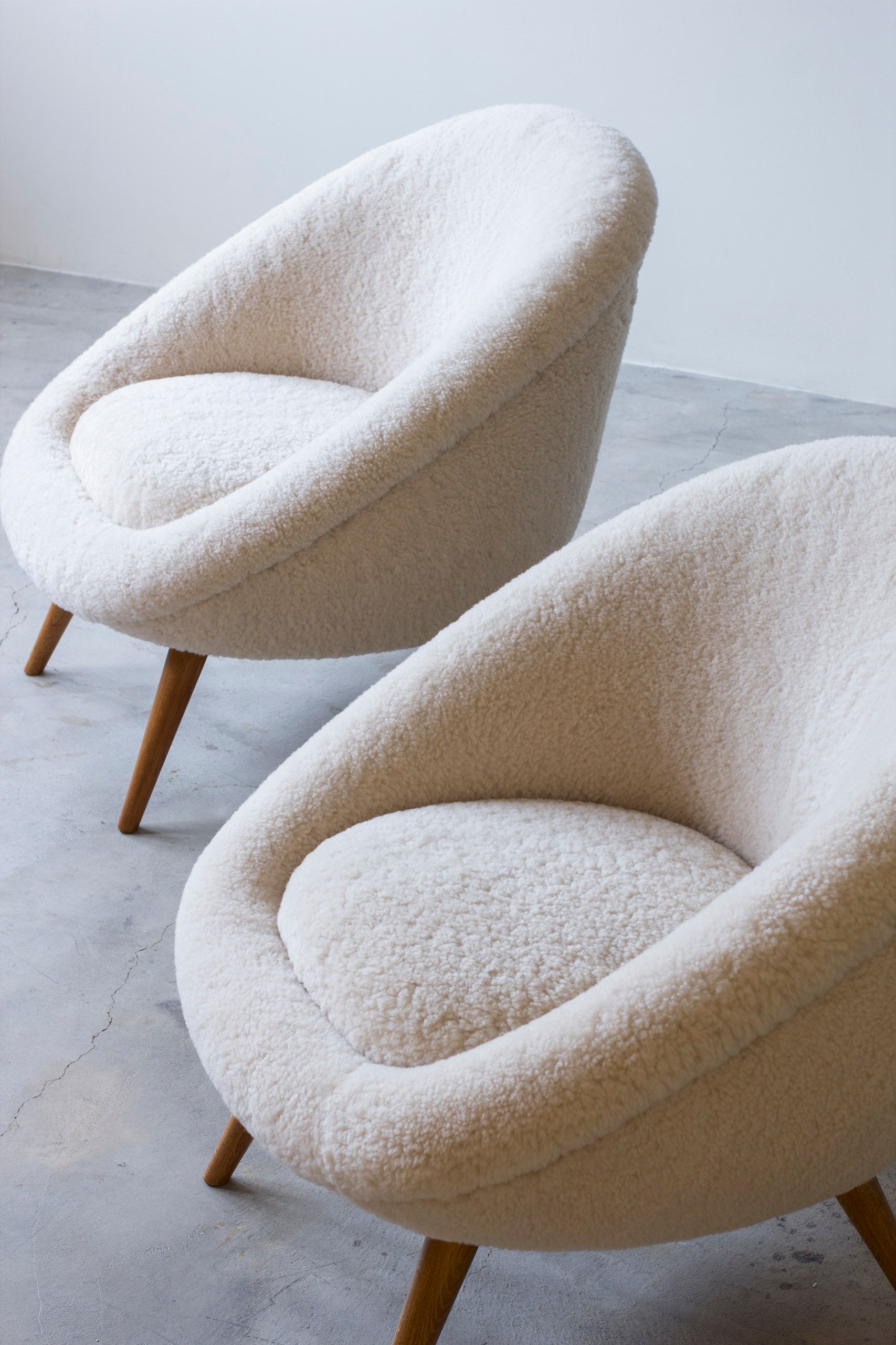 Lounge chairs "Oeuf" in the style of Jean Royere