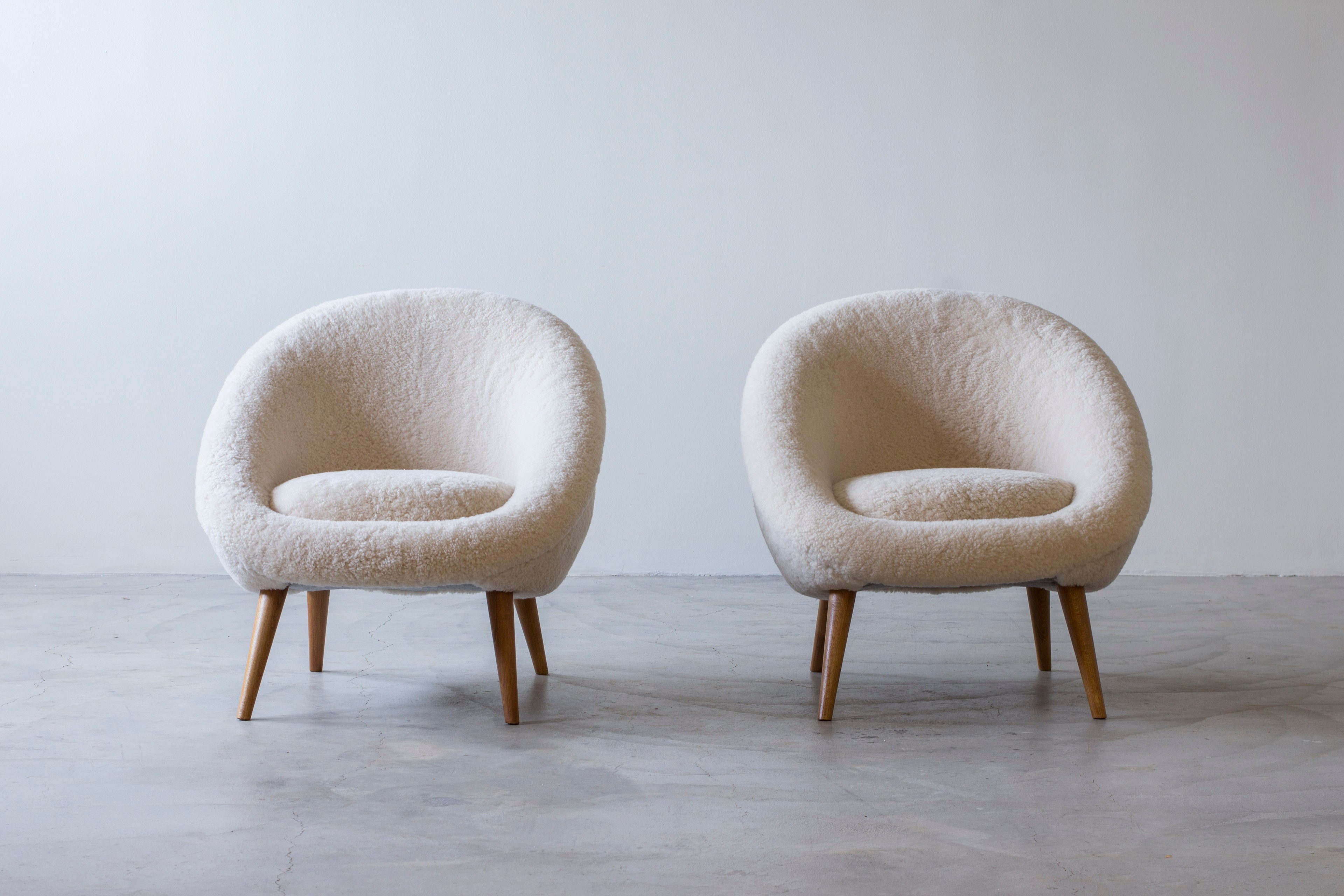 Lounge chairs "Oeuf" in the style of Jean Royere