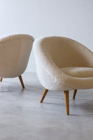 Lounge chairs "Oeuf" in the style of Jean Royere