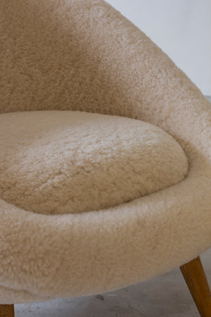 Lounge chairs "Oeuf" in the style of Jean Royere