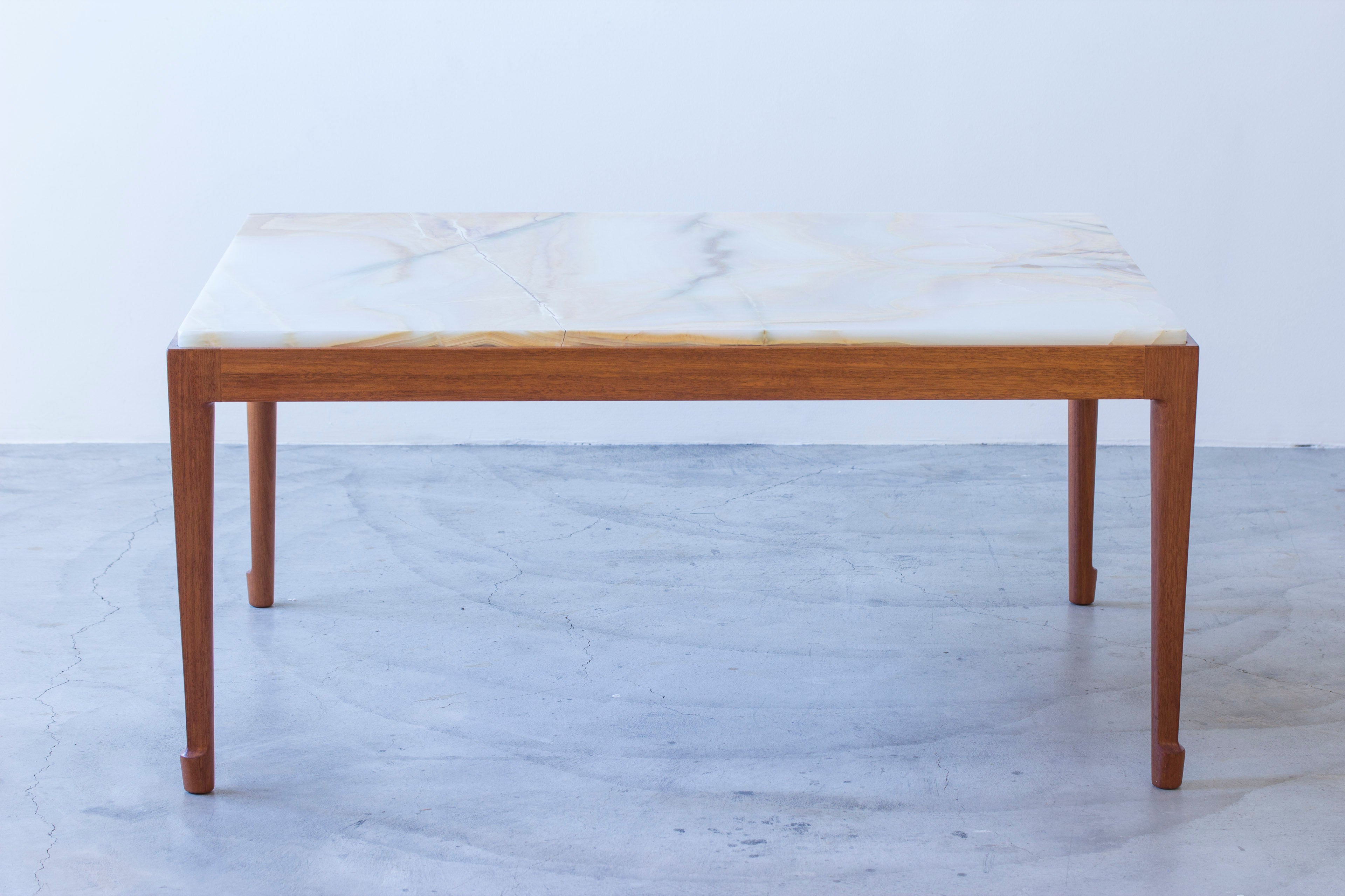 Onyx sofa table in the style of Frank