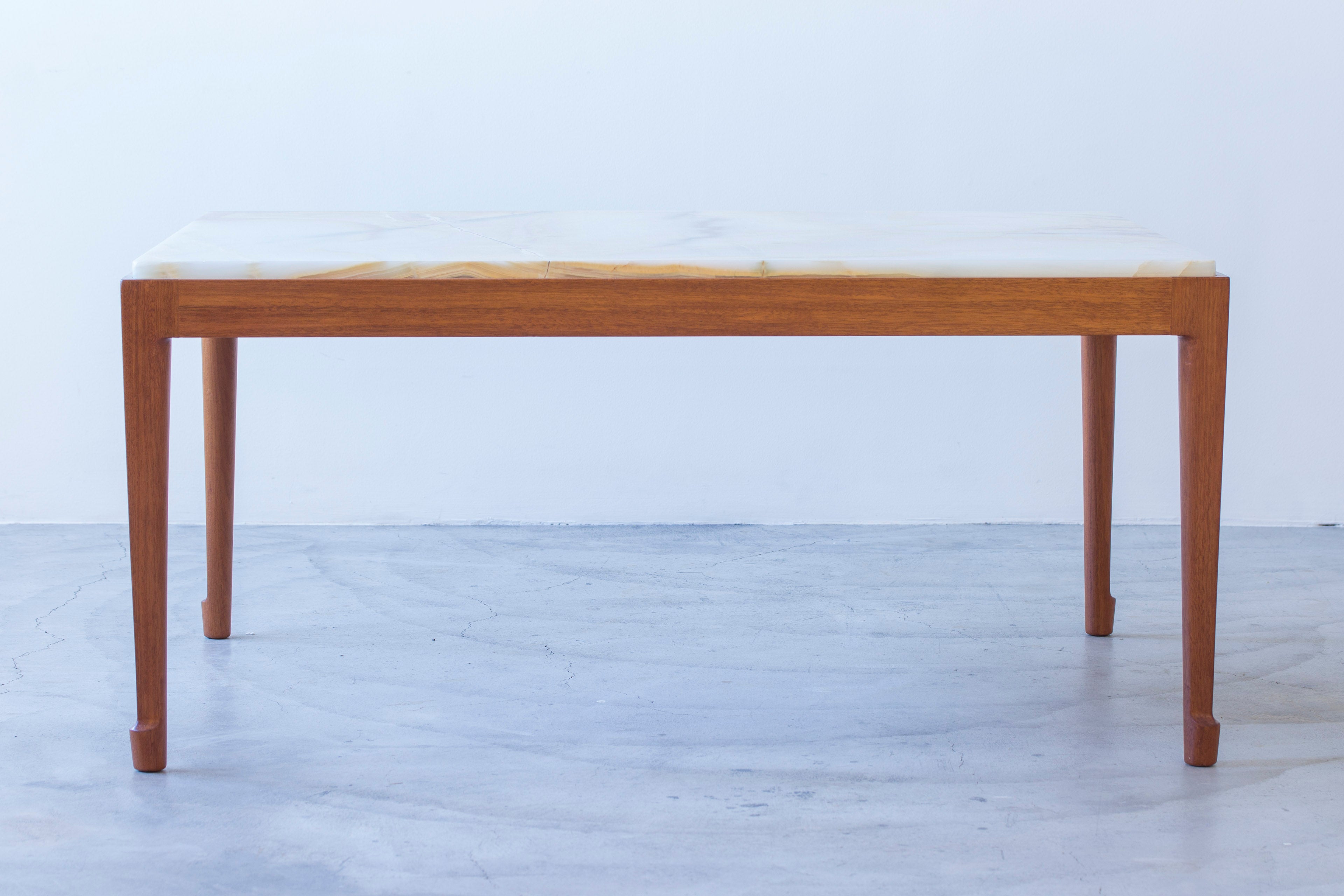 Onyx sofa table in the style of Frank