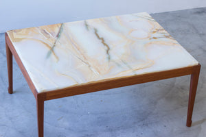 Onyx sofa table in the style of Frank