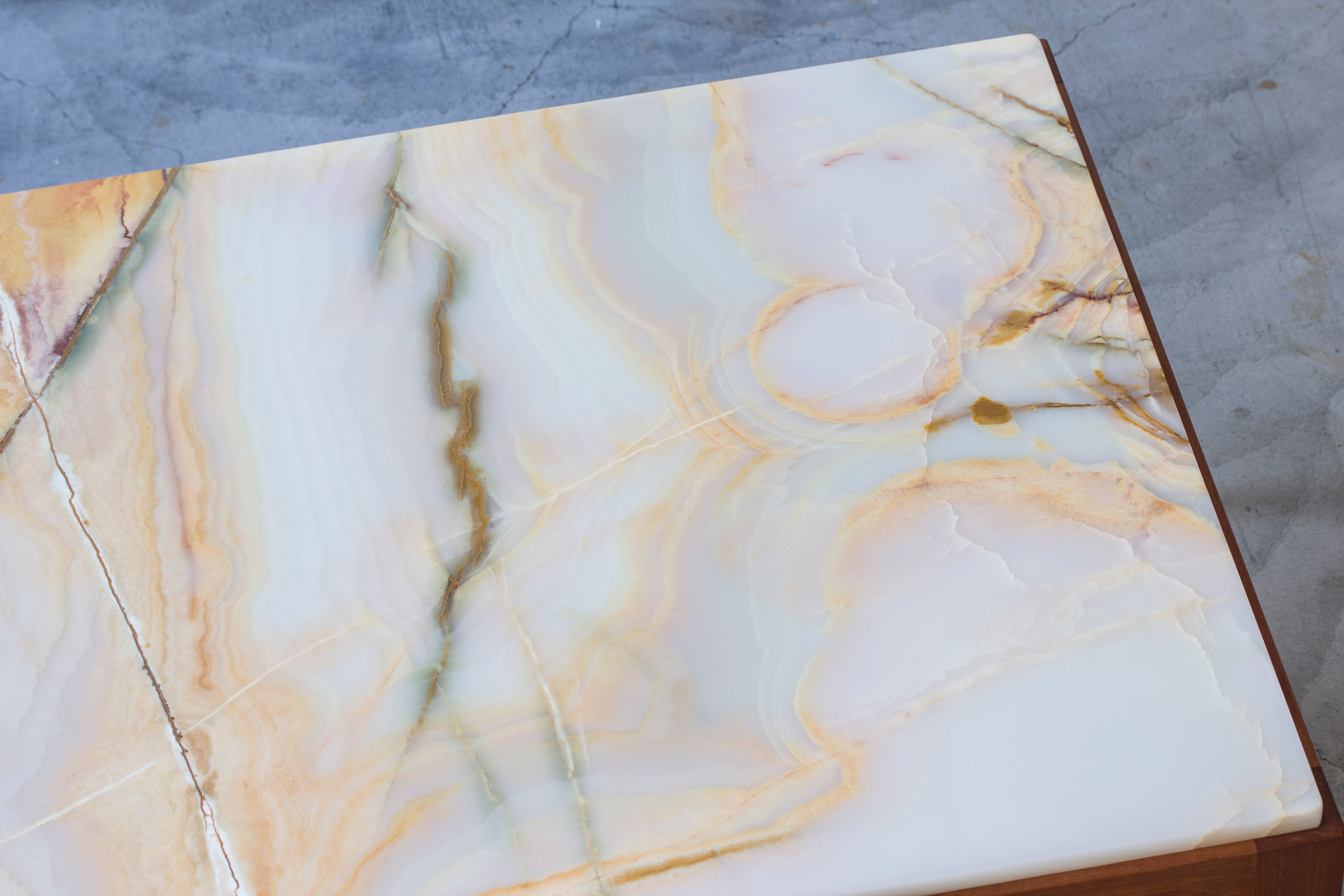Onyx sofa table in the style of Frank
