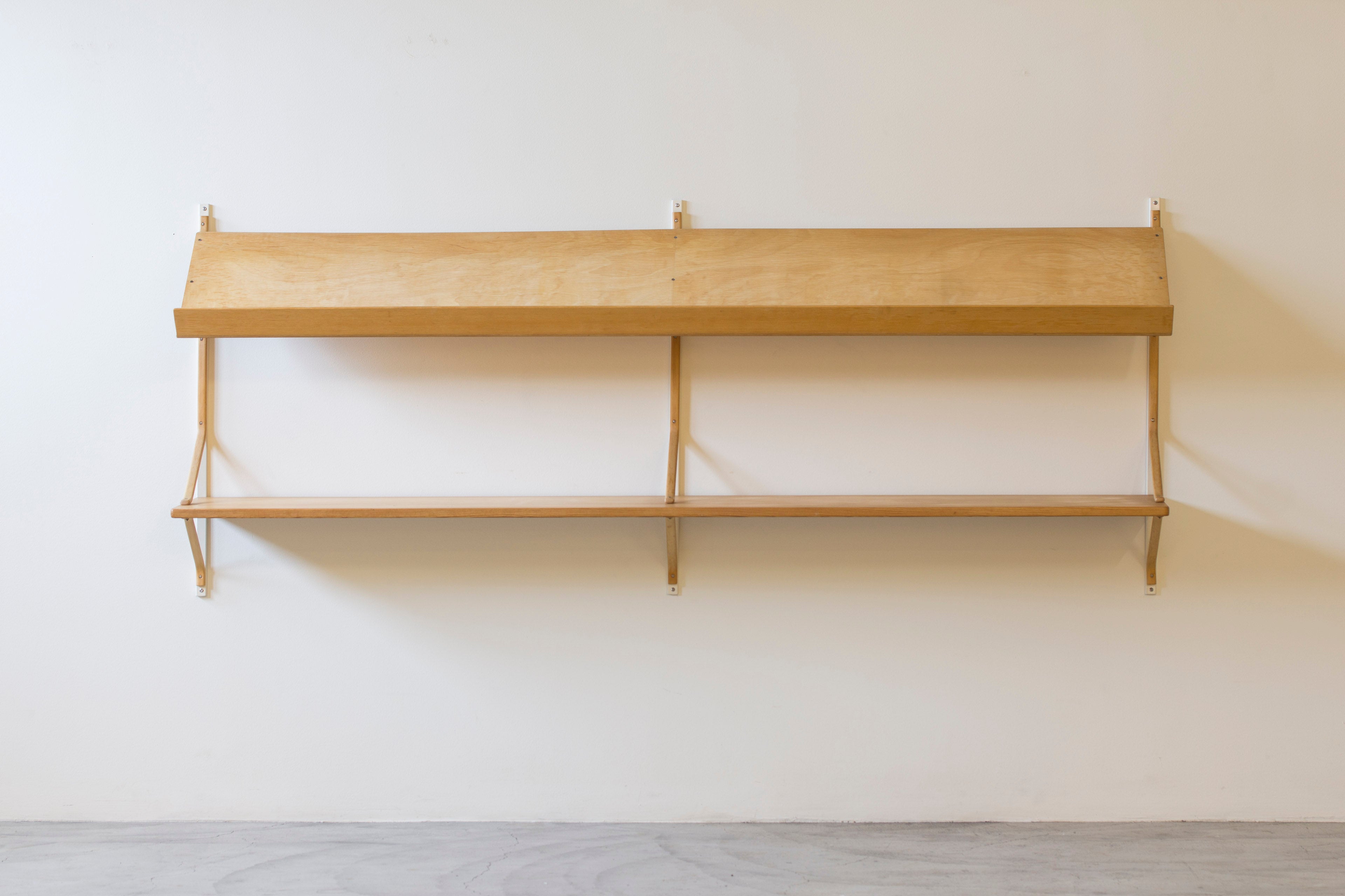 Wall shelf by Bruno Mathsson