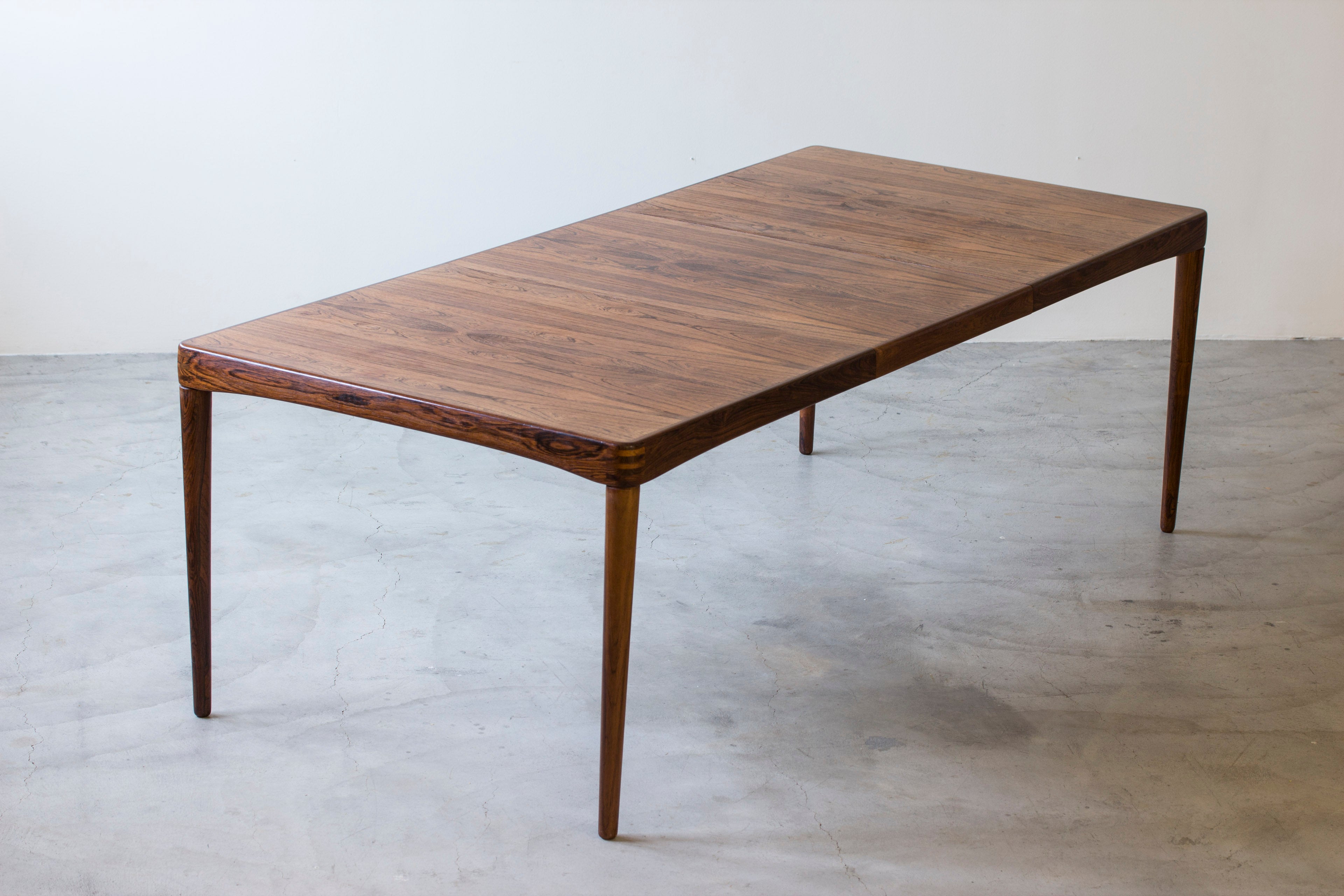 Palisander dining table by H. W Klein.