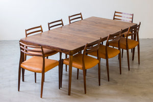 Palisander dining table by H. W Klein.
