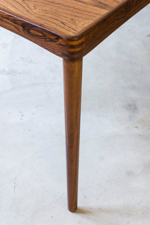 Palisander dining table by H. W Klein.