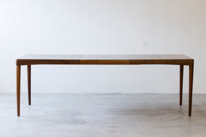 Palisander dining table by H. W Klein.