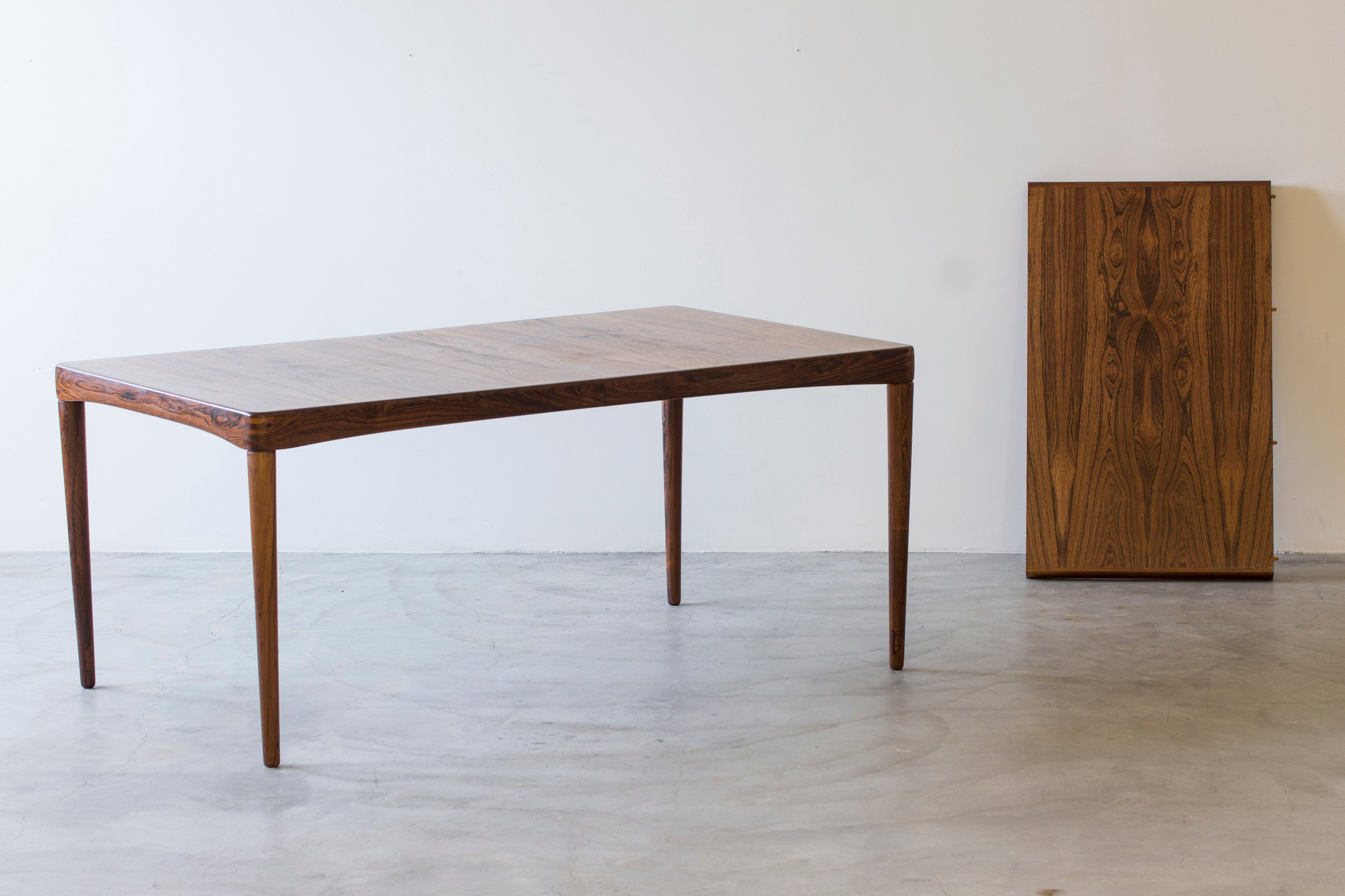 Palisander dining table by H. W Klein.
