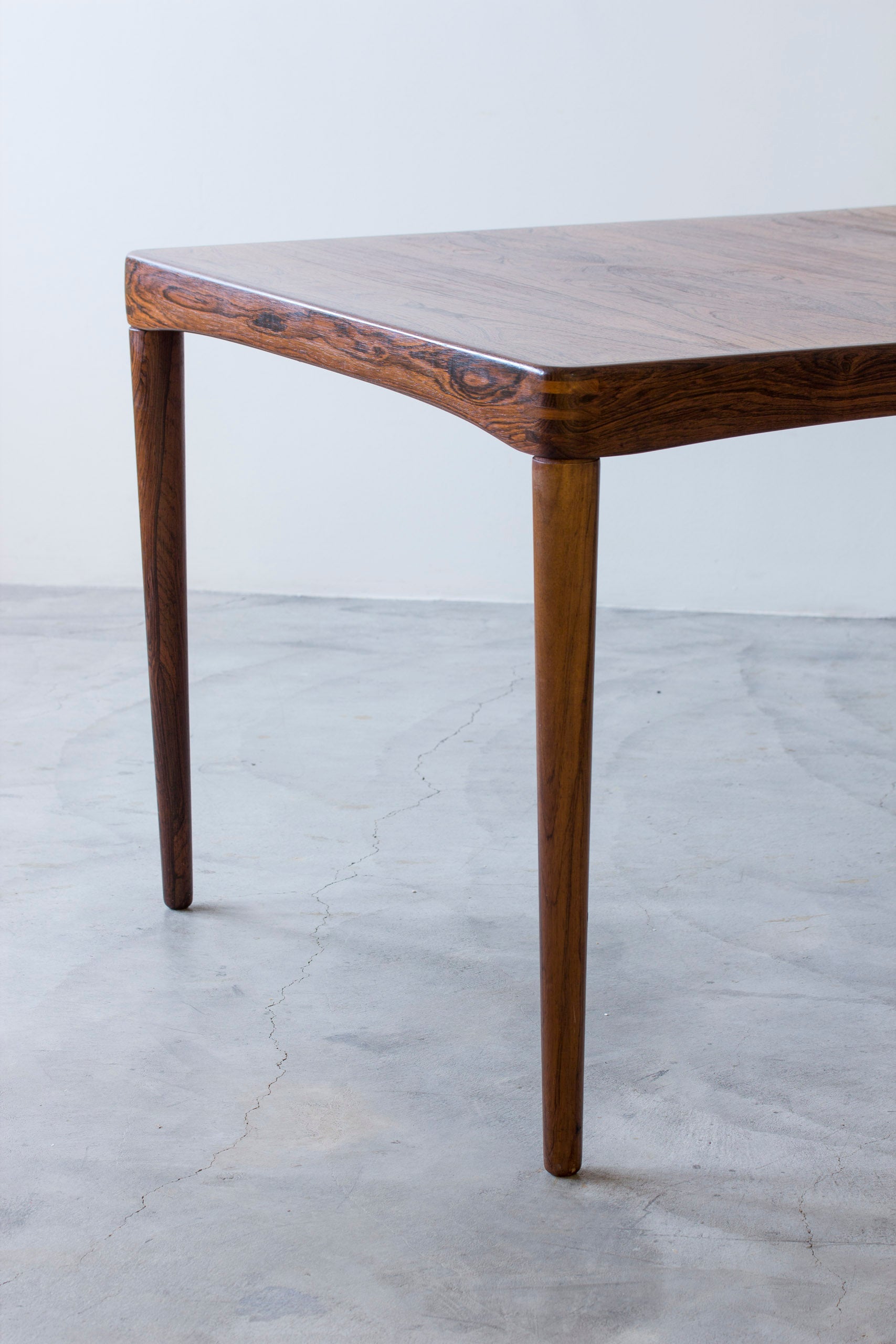 Palisander dining table by H. W Klein.