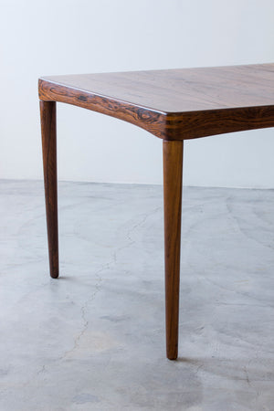 Palisander dining table by H. W Klein.