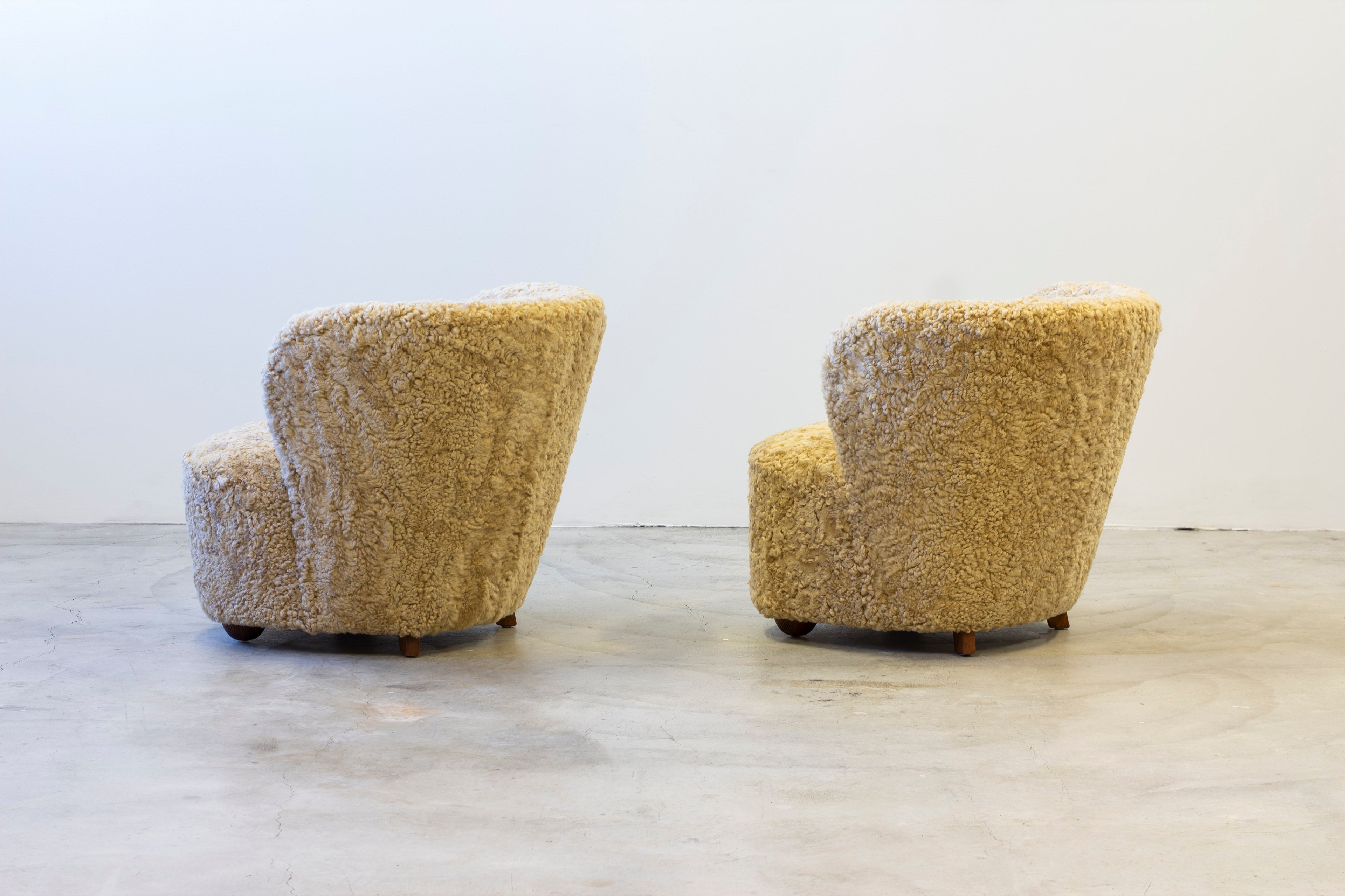 Pair of sheepskin chairs in the manner of Boesen