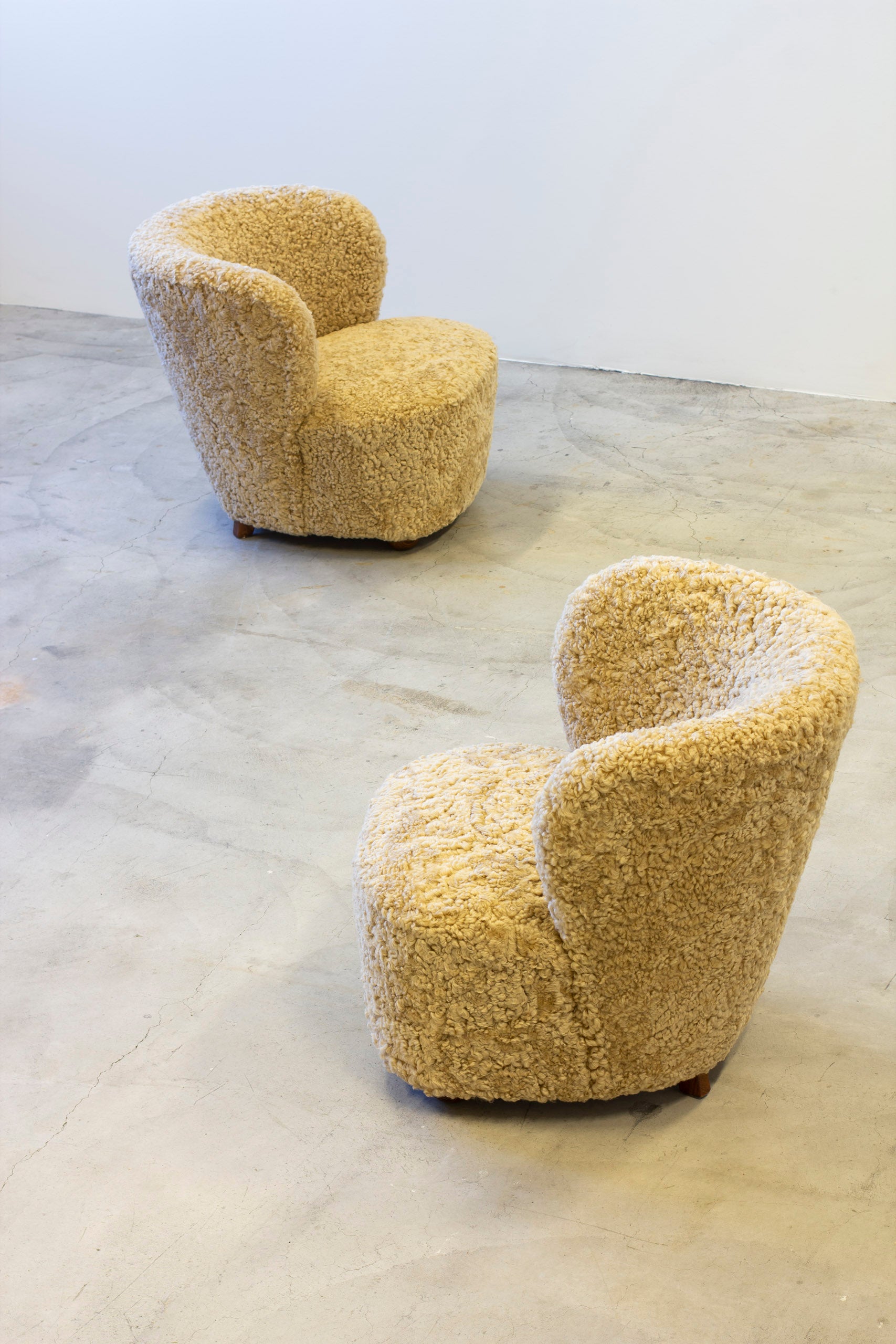 Pair of sheepskin chairs in the manner of Boesen