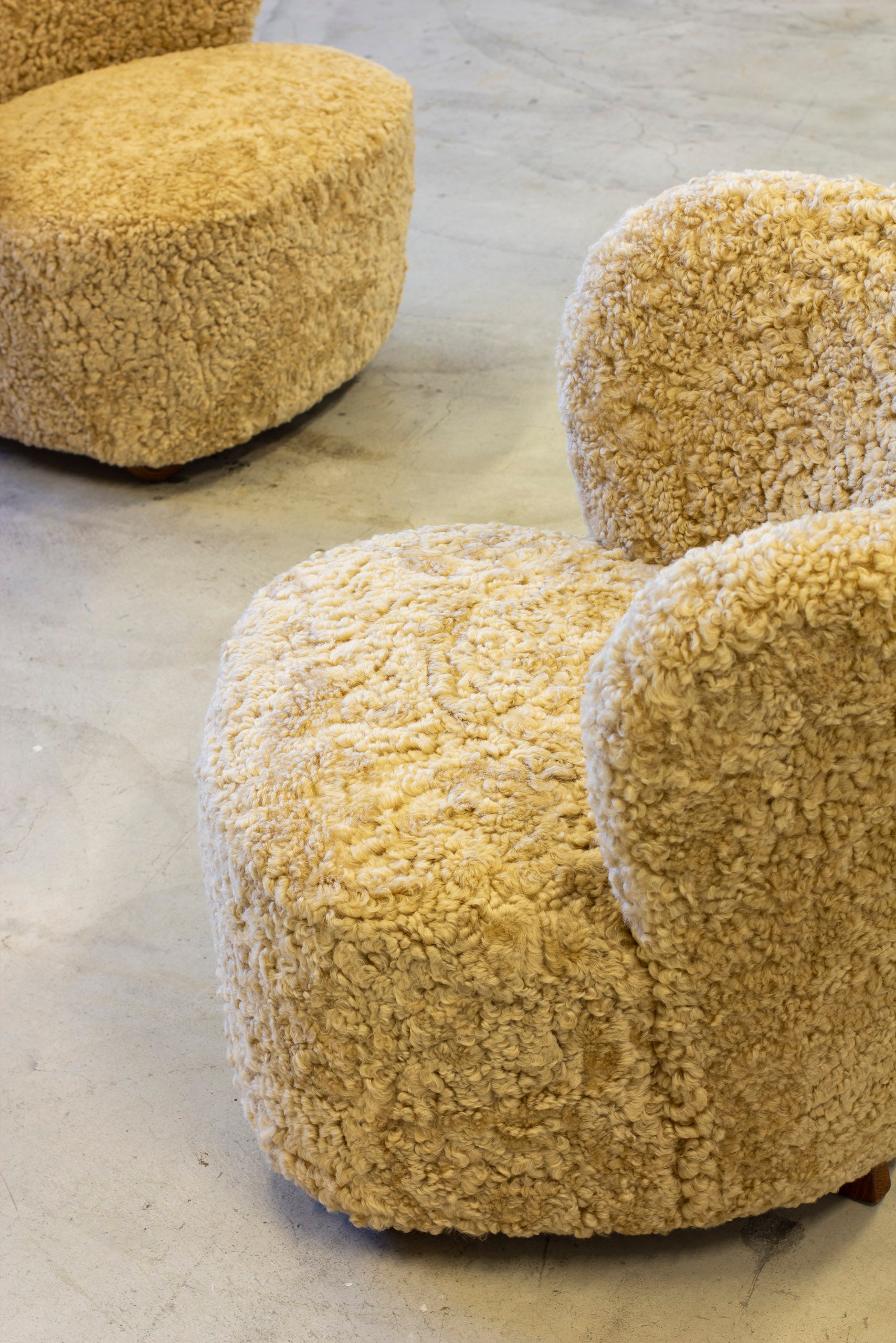 Pair of sheepskin chairs in the manner of Boesen