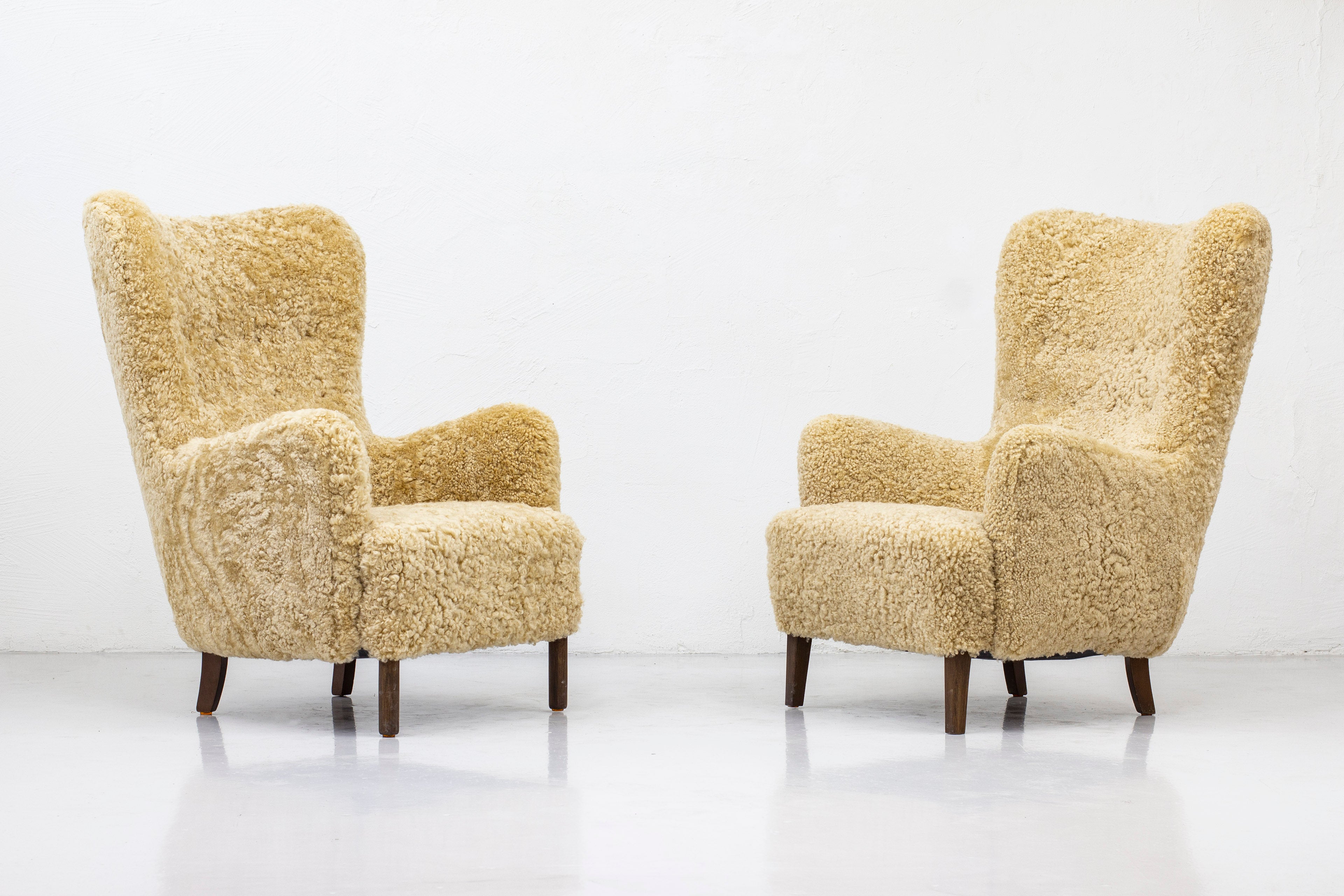 Danish modern high back chair with sheepskin