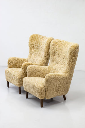 Danish modern high back chair with sheepskin
