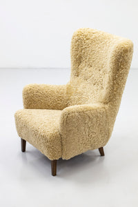 Danish modern high back chair with sheepskin