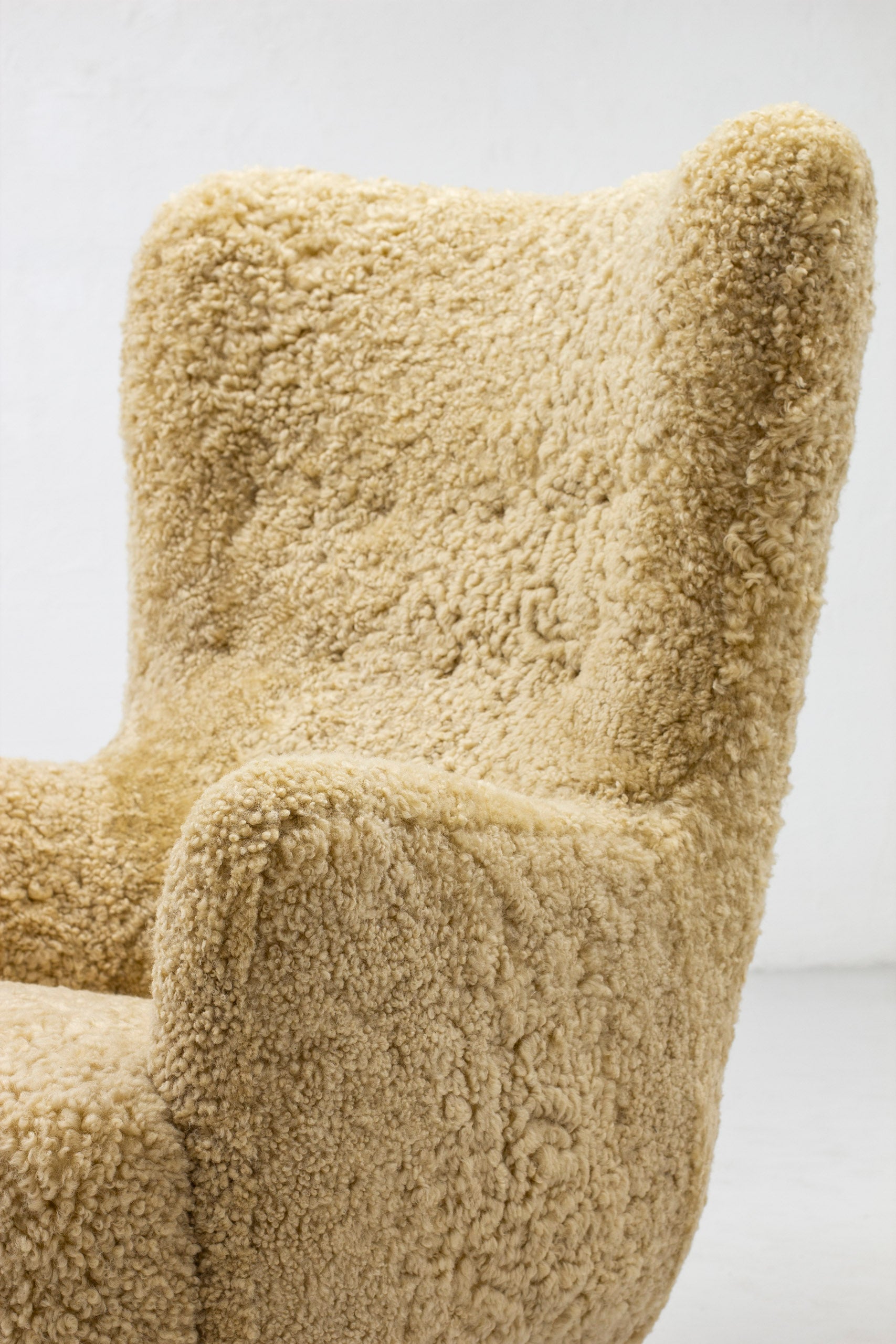 Danish modern high back chair with sheepskin