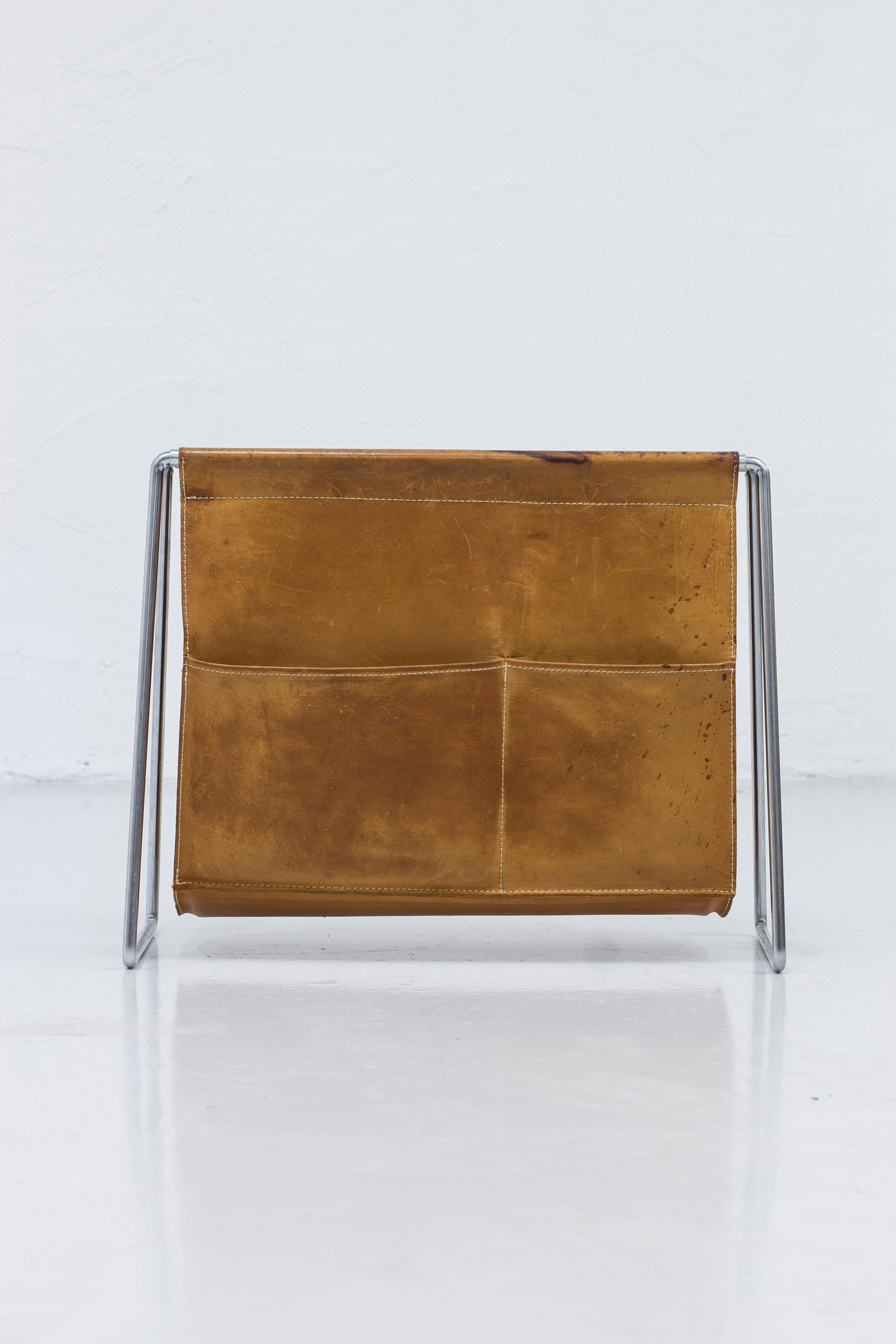 "Bachelor" magazine rack by Panton